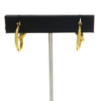 Celine Knot Small Gold Finish Brass Earrings — view 3