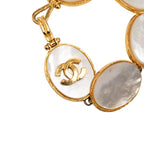 Chanel CC Logo Bangle Gold White Plated Bracelet — view 4