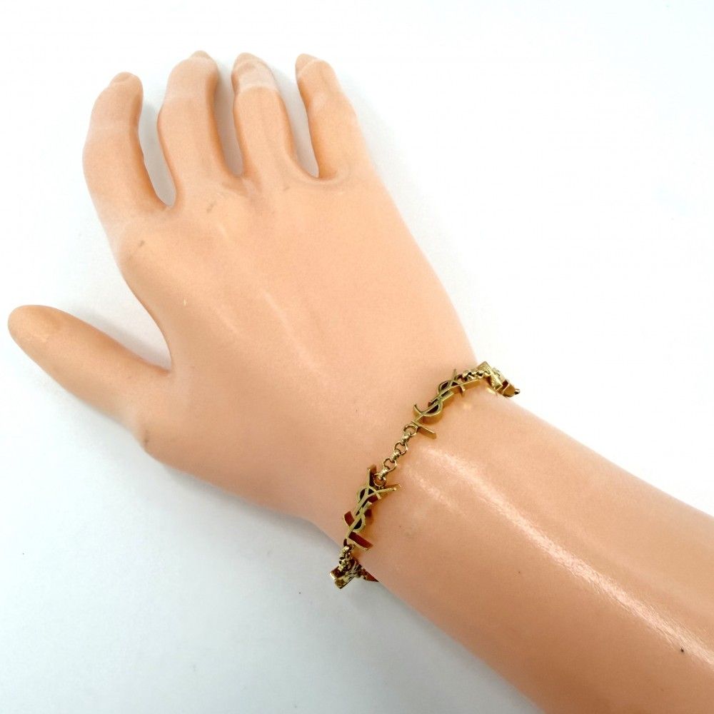 Saint Laurent Paris Bracelet Cassandra YSL Logo Star M Multi Charm Gold — view 2