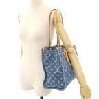 Louis Vuitton Monogram Denim On The Go MM Remix Tote — view 9