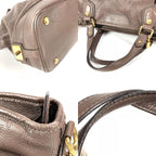 Louis Vuitton Handbag Stella PM Monogram Mahina Leather Brown — view 7
