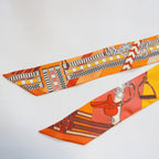 Hermes Twilly Bridle and Charm Silk 100% Orange Pawn Scarf — view 6