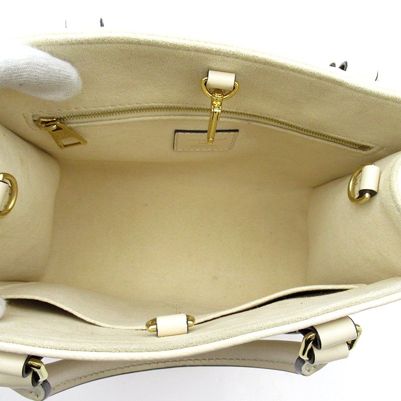 Louis Vuitton On The Go PM Monogram Empreinte Handbag Cles — view 7