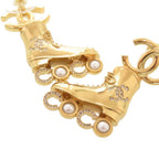 Chanel CC Logo Roller Skate Metal Rhinestone Faux Pearl Gold Earrings — view 4