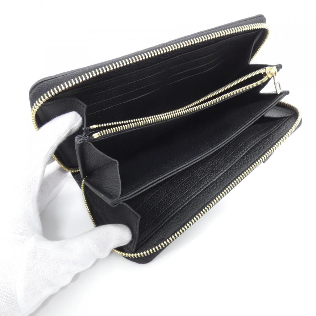 Louis Vuitton Monogram Empreinte Zippy Wallet — view 7