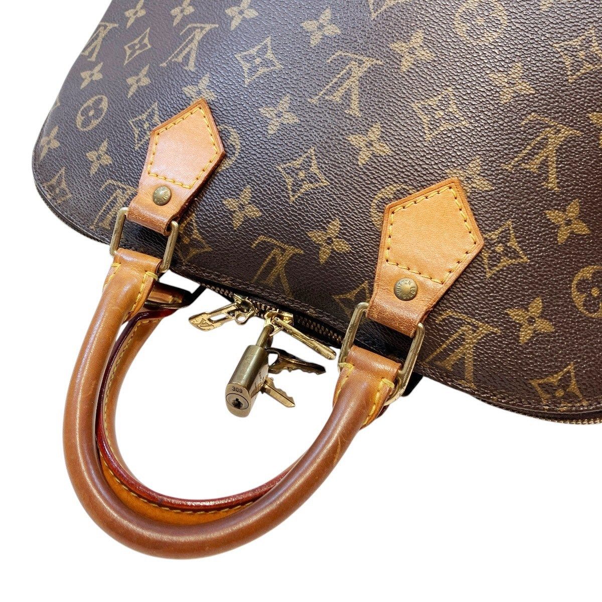 Louis Vuitton Alma Monogram Handbag Canvas — view 8