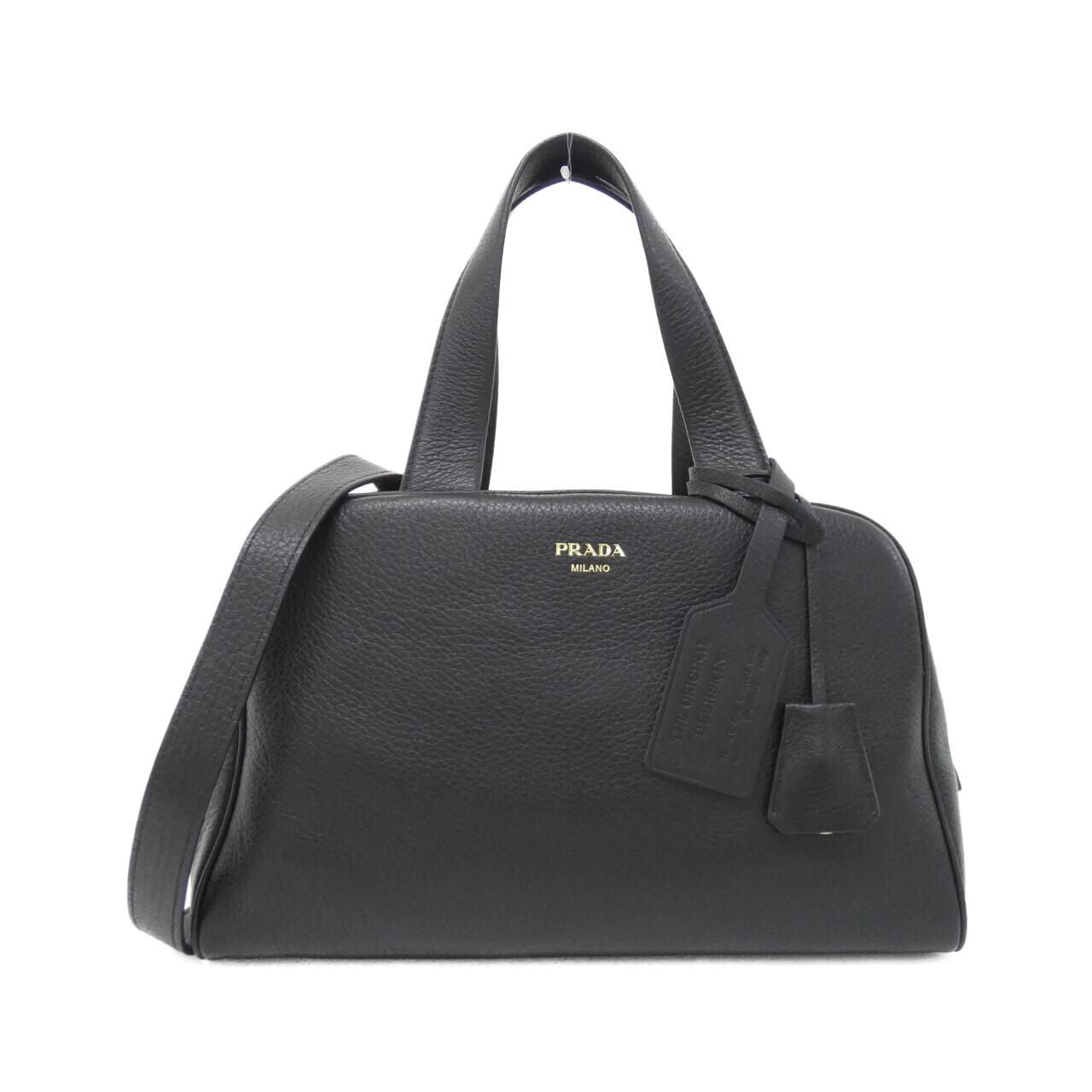 Prada Boston Bag Travel Bags Gold