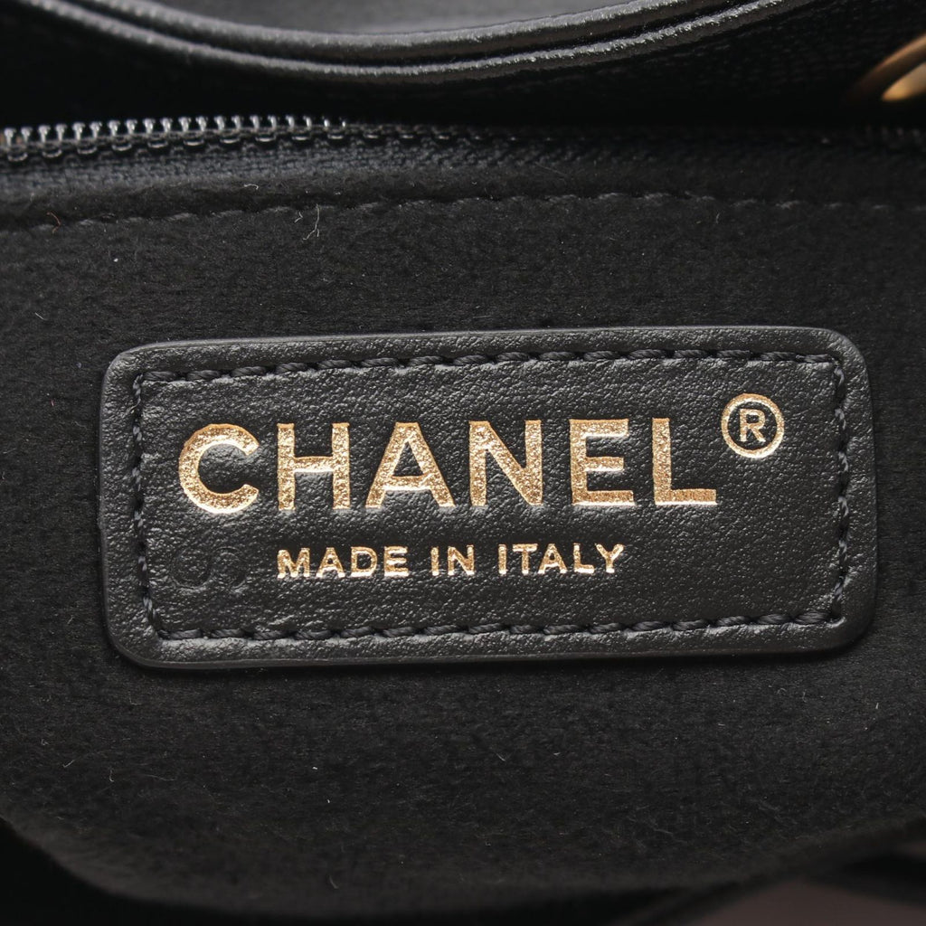Chanel Shoulder Bag Deauville Drawstring Black Caviar Leather Logo Studs — view 4