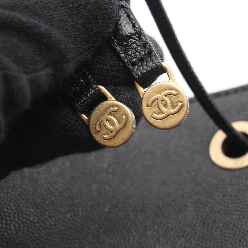Chanel Shoulder Bag Deauville Drawstring Black Caviar Leather Logo Studs — view 8