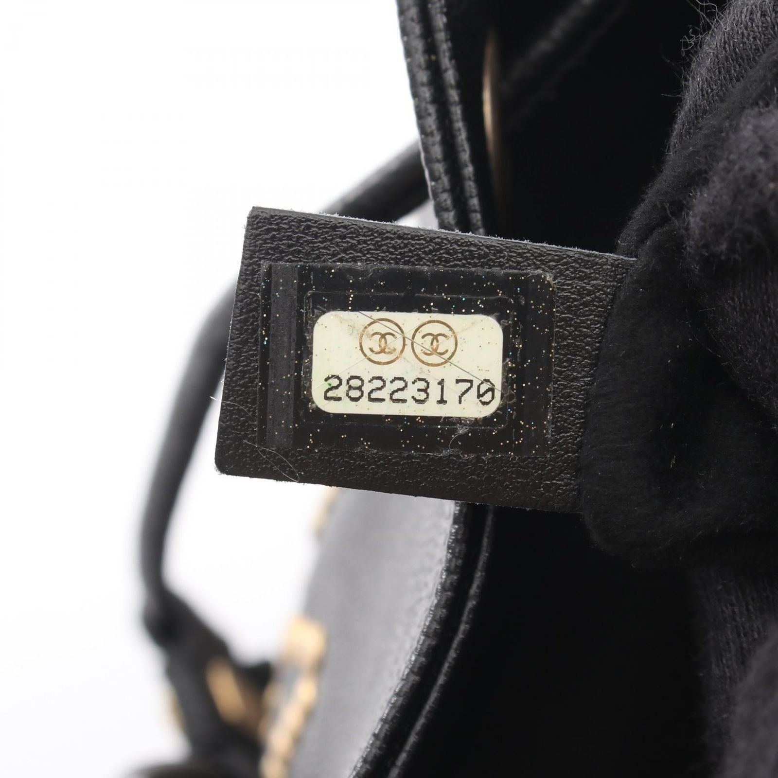 Chanel Shoulder Bag Deauville Drawstring Black Caviar Leather Logo Studs — view 5
