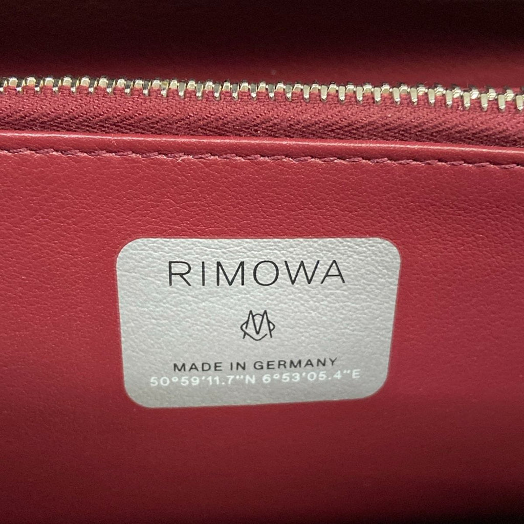 Dior Clutch and Rimowa Personal Leather — view 9