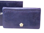 Chanel Camellia Wallet Lambskin Black Gold Bifold