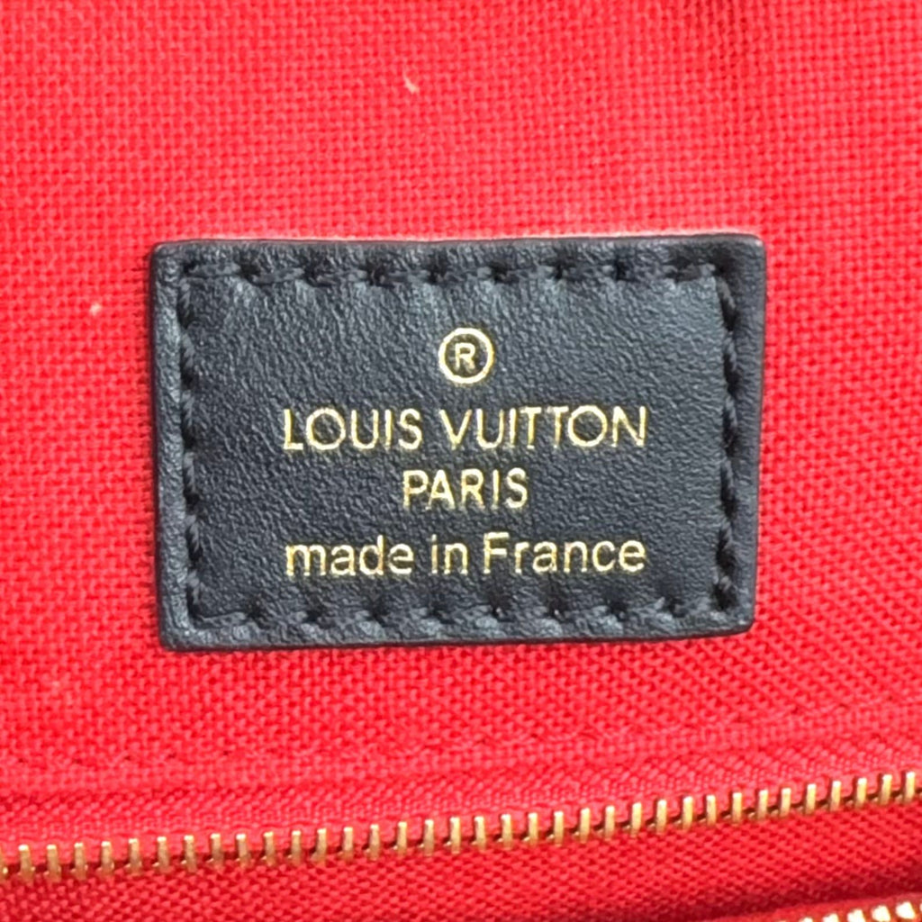 Louis Vuitton On The Go Monogram Giant Reverse Leather Brown Beige Handbag Gold — view 4