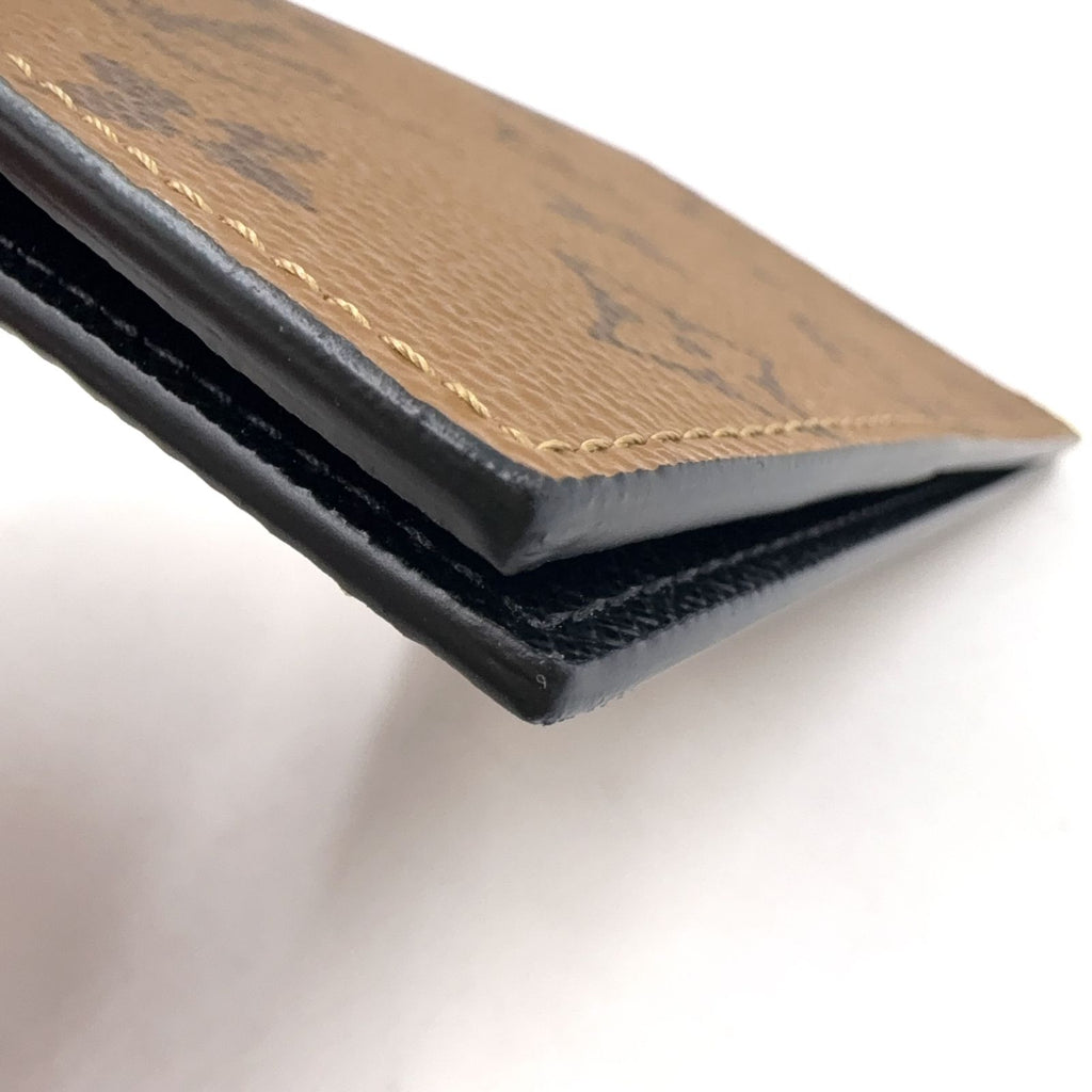 Louis Vuitton Couverture Passport Monogram Reverse Leather Black Light Brown — view 8