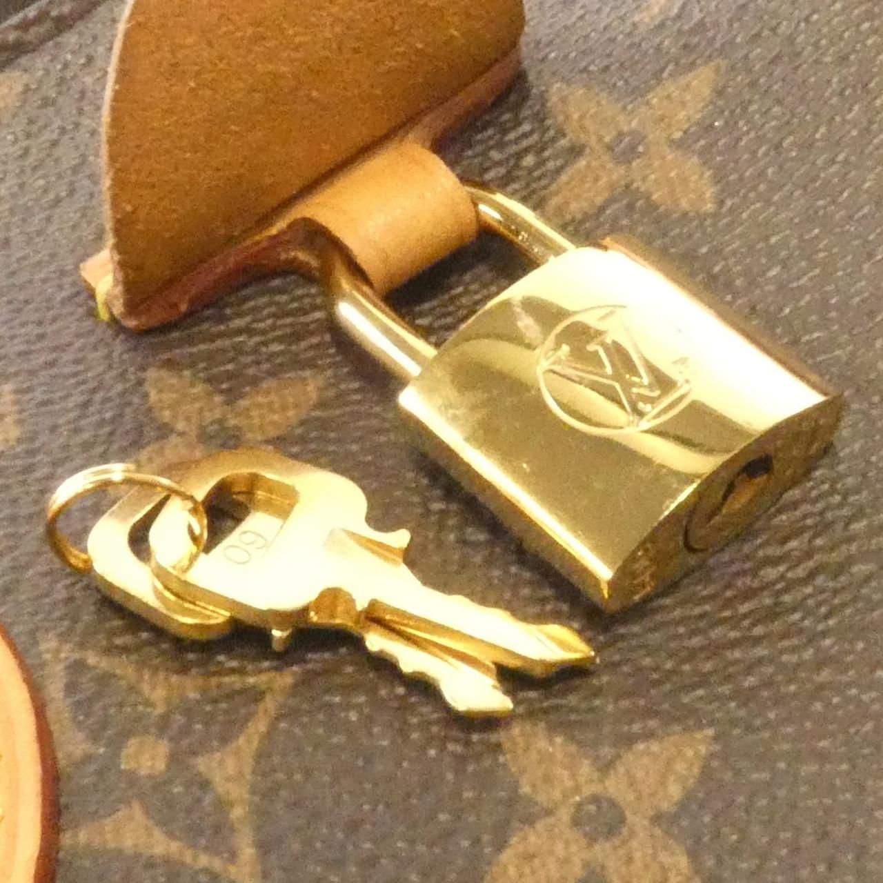 Louis Vuitton Monogram Rivoli PM — view 4
