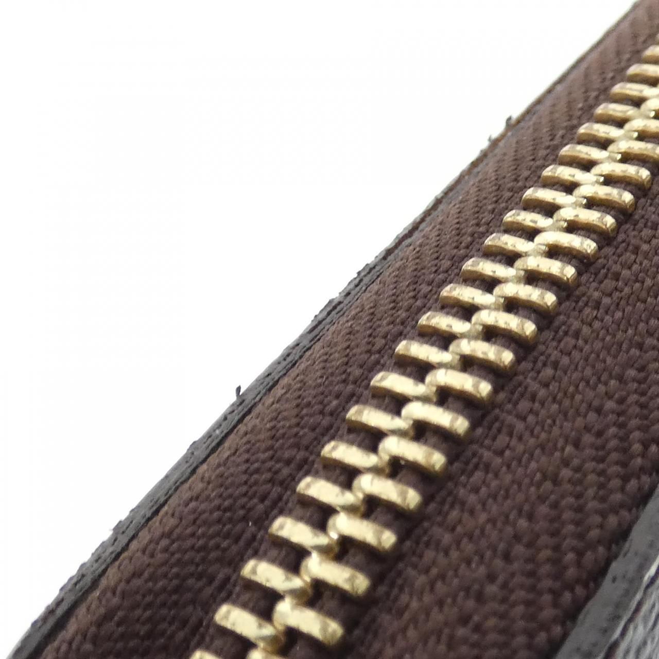 Louis Vuitton Monogram Pumpkin Dot Zippy Wallet — view 4
