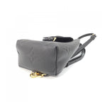 Louis Vuitton Monogram Empreinte Tiny Backpack — view 3