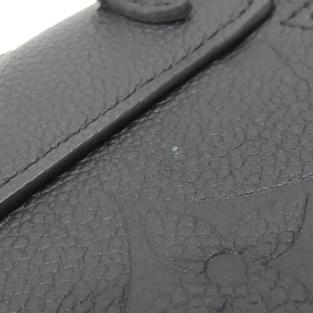 Louis Vuitton Monogram Empreinte Tiny Backpack — view 6