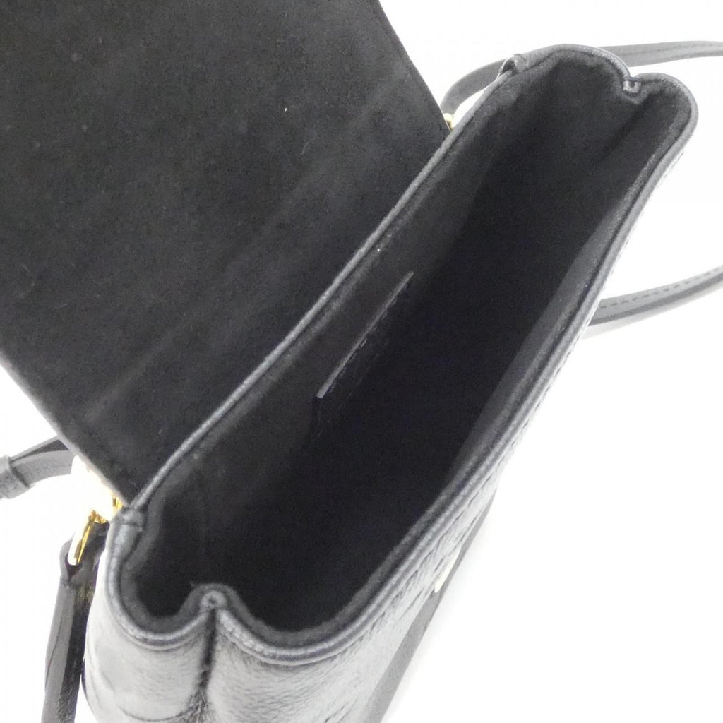 Louis Vuitton Monogram Empreinte Tiny Backpack — view 9