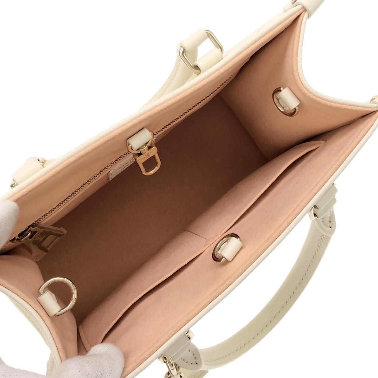 Louis Vuitton Bicolor Monogram Empreinte On The Go PM — view 7