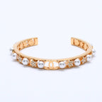 Chanel CC Logo Bangle Faux Pearl Gold Metal Rhinestone Bracelet — view 2