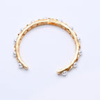 Chanel CC Logo Bangle Faux Pearl Gold Metal Rhinestone Bracelet — view 7