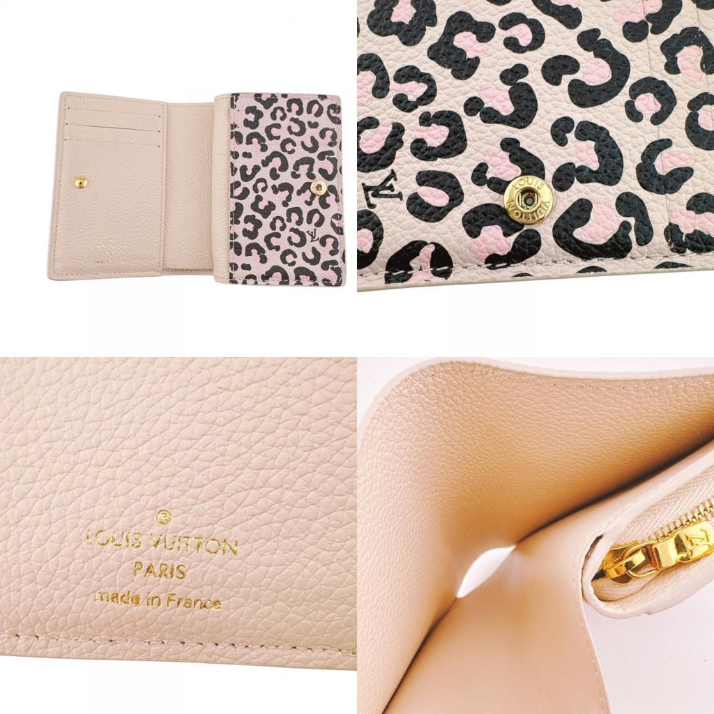 Louis Vuitton Portefeuille Clair Empreinte Leather Trifold Wallet White — view 8