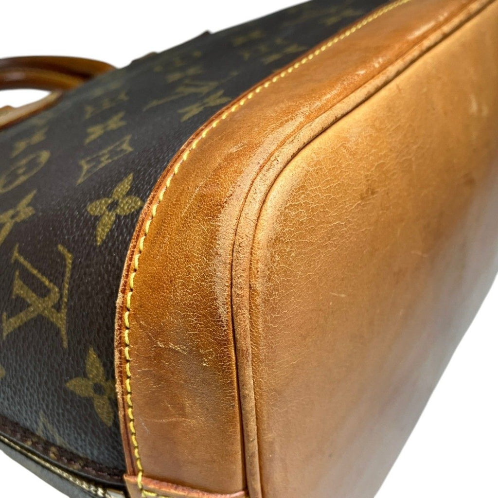 Louis Vuitton Alma Monogram Handbag Canvas — view 7