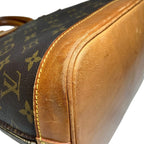 Louis Vuitton Alma Monogram Handbag Canvas — view 7