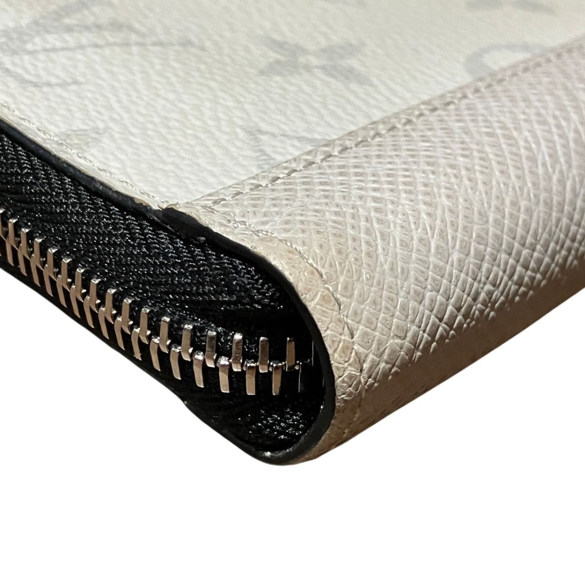 Louis Vuitton Taigarama Zippy Wallet Vertical Taiga Leather — view 7