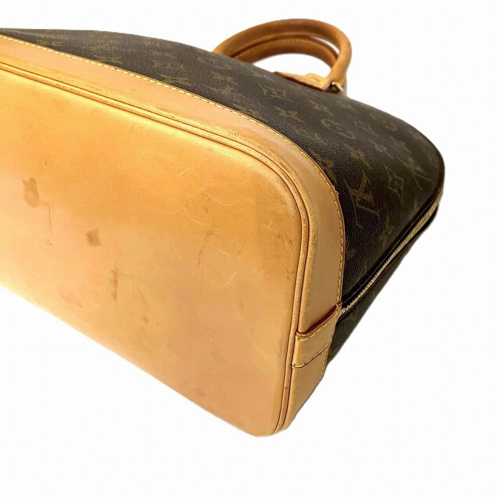 Louis Vuitton Alma Monogram Handbag Canvas — view 7