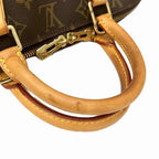Louis Vuitton Alma Monogram Handbag Canvas — view 9