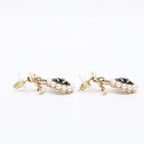 Chanel Imitation Pearl CC Logo Drop Earring — view 4
