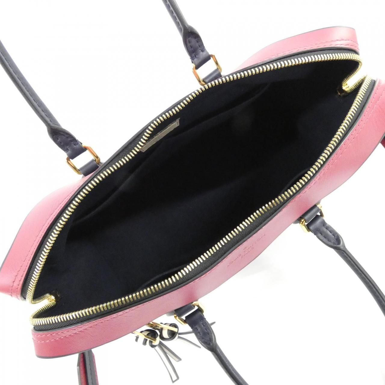 Louis Vuitton Monogram Roulis Tote — view 7