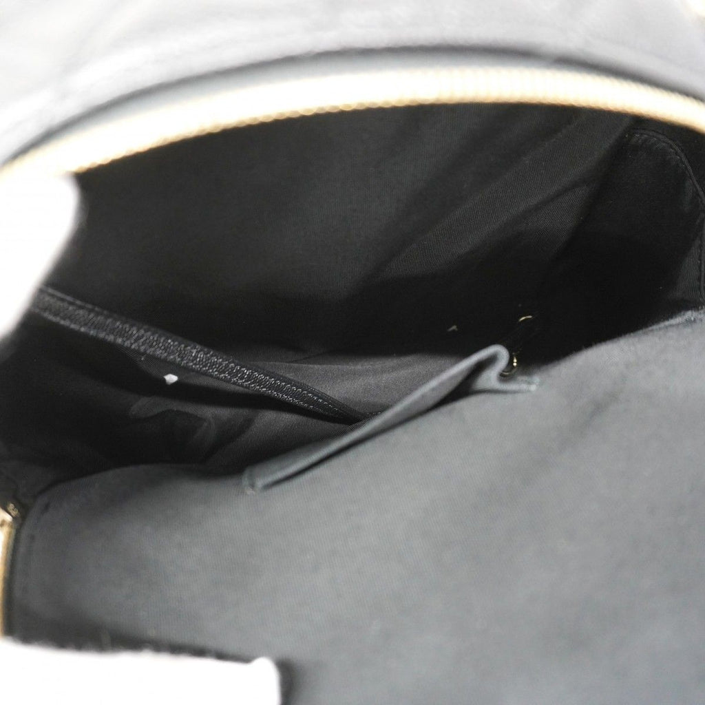 Chanel Backpack Quilted Caviar Leather Black Champagne Gold — view 4