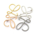 Loewe Brooch Silver Gold Pink Anagram
