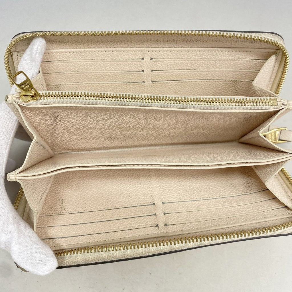 Louis Vuitton Wallet Monogram Empreinte by the Pool Zippy Cream Saffron — view 3