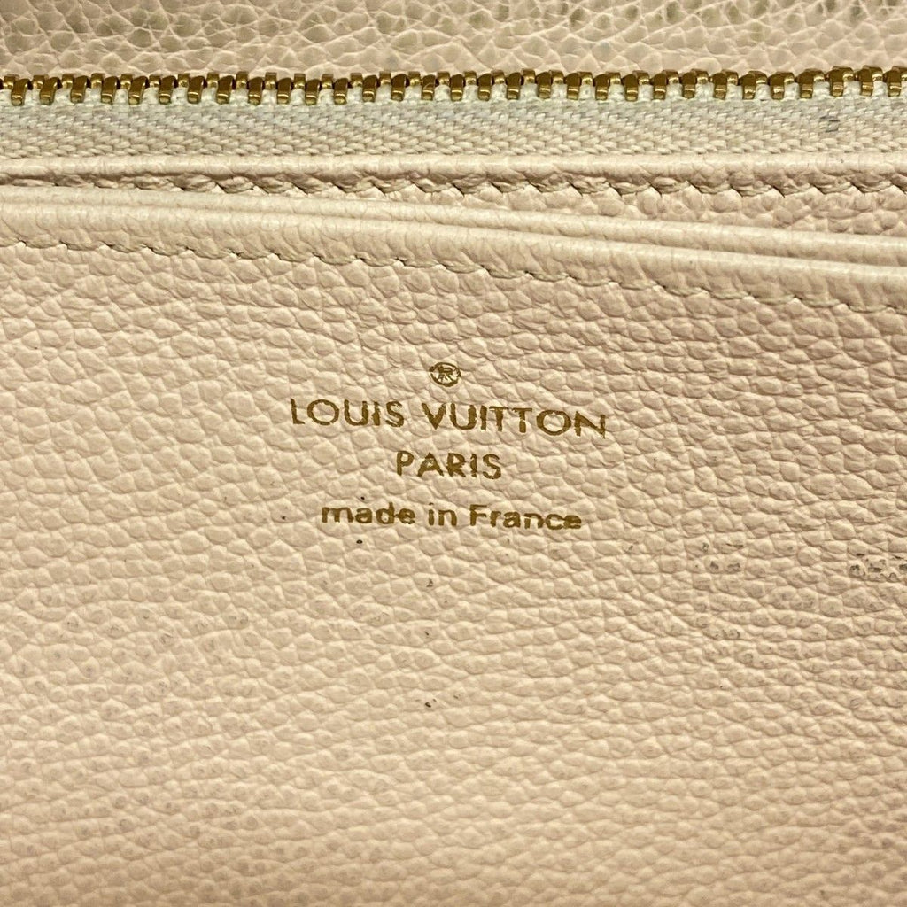 Louis Vuitton Wallet Monogram Empreinte by the Pool Zippy Cream Saffron — view 4