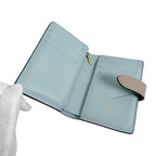 Louis Vuitton Taurillon Leather Bifold Wallet Vertical Compact Beige — view 9