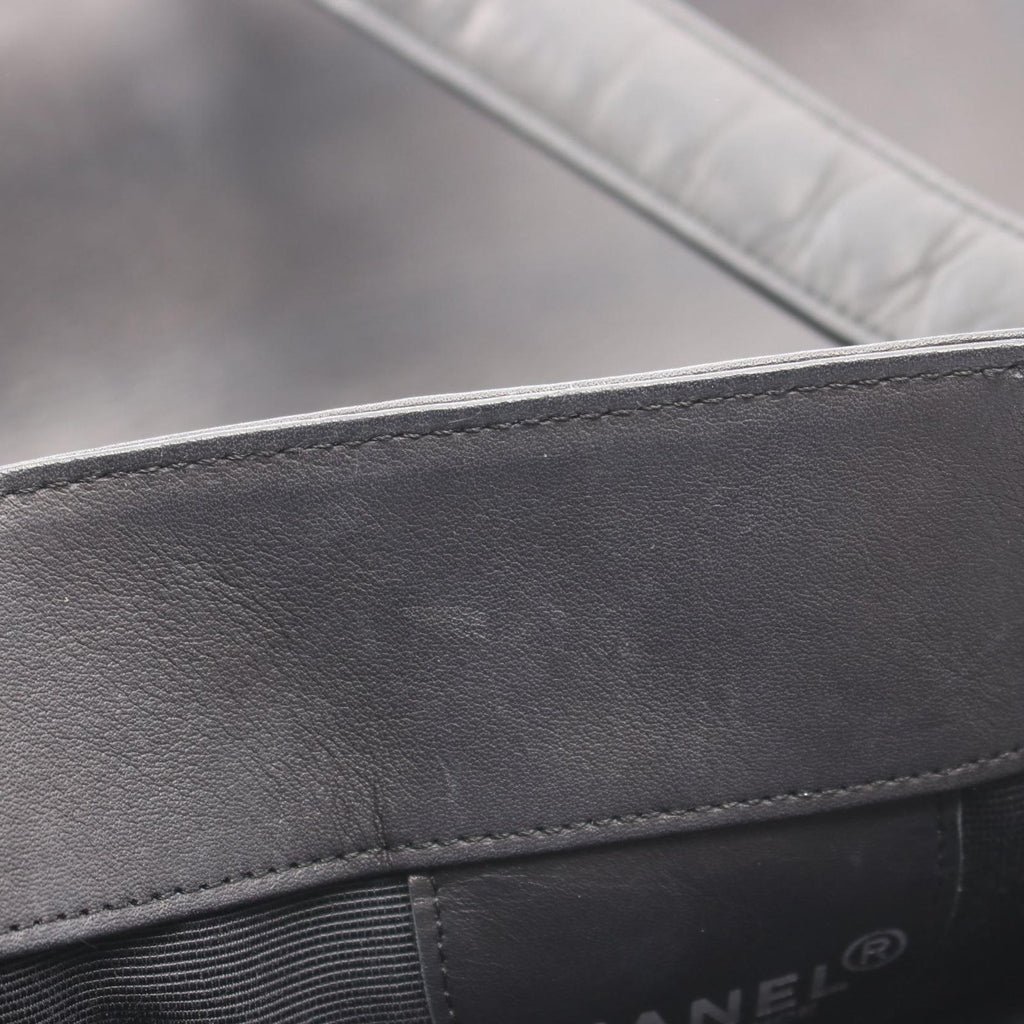 Chanel Shoulder Bag Embossed Logo Black Lambskin — view 6