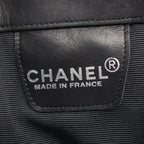 Chanel Shoulder Bag Embossed Logo Black Lambskin — view 4