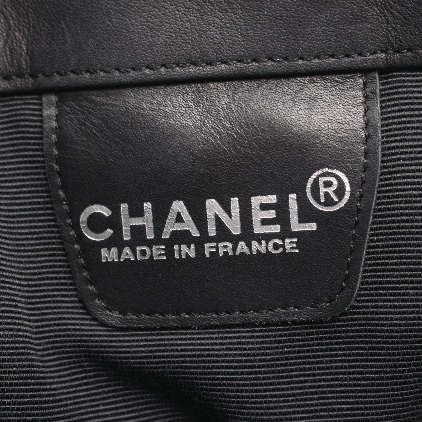 Chanel Shoulder Bag Embossed Logo Black Lambskin — view 4