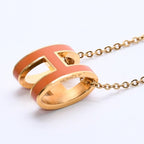 Hermes Pop H Necklace Orange Lacquer Oval Forme Brass Gold Pendant — view 3