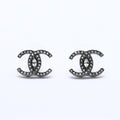Chanel CC Logo Earrings 21 Rhinestone Metal Gunmetal Clear