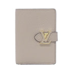 Louis Vuitton Taurillon LV Vertical Wallet Compact