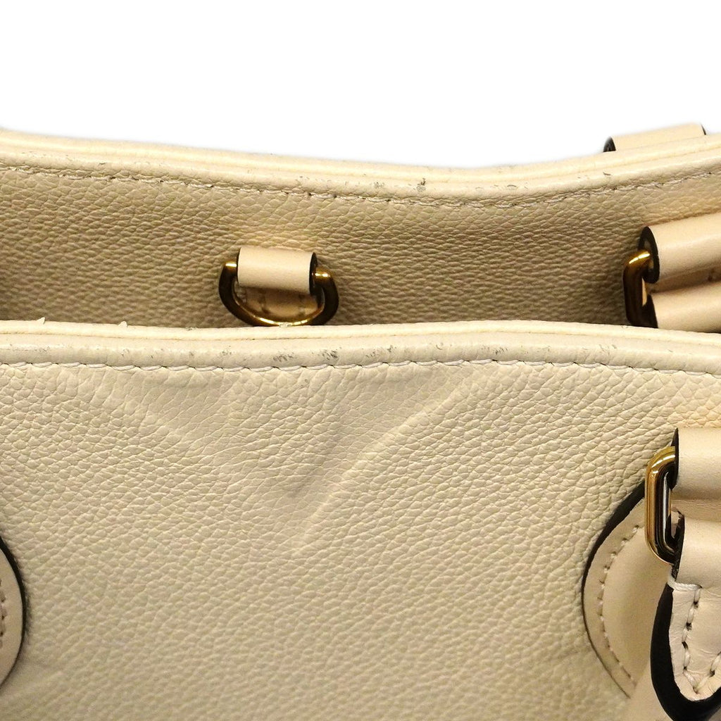Louis Vuitton Tote Monogram Empreinte On The Go MM Cream 2-Way — view 8