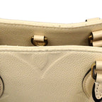 Louis Vuitton Tote Monogram Empreinte On The Go MM Cream 2-Way — view 8