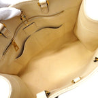 Louis Vuitton Tote Monogram Empreinte On The Go MM Cream 2-Way — view 4