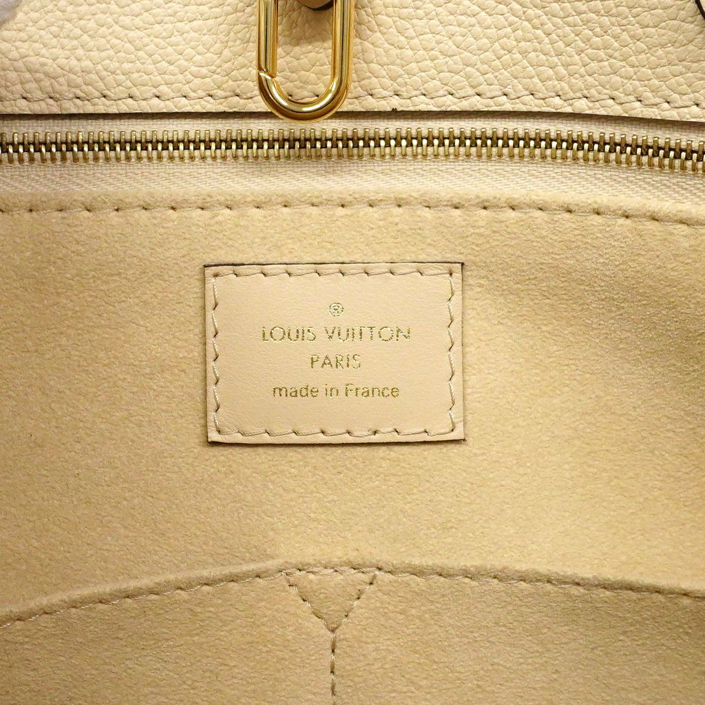 Louis Vuitton Tote Monogram Empreinte On The Go MM Cream 2-Way — view 5