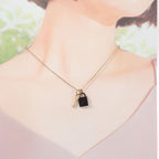 Hermes Amulet Padlock PM Necklace Metal Buffalo Horn Gold Black — view 8